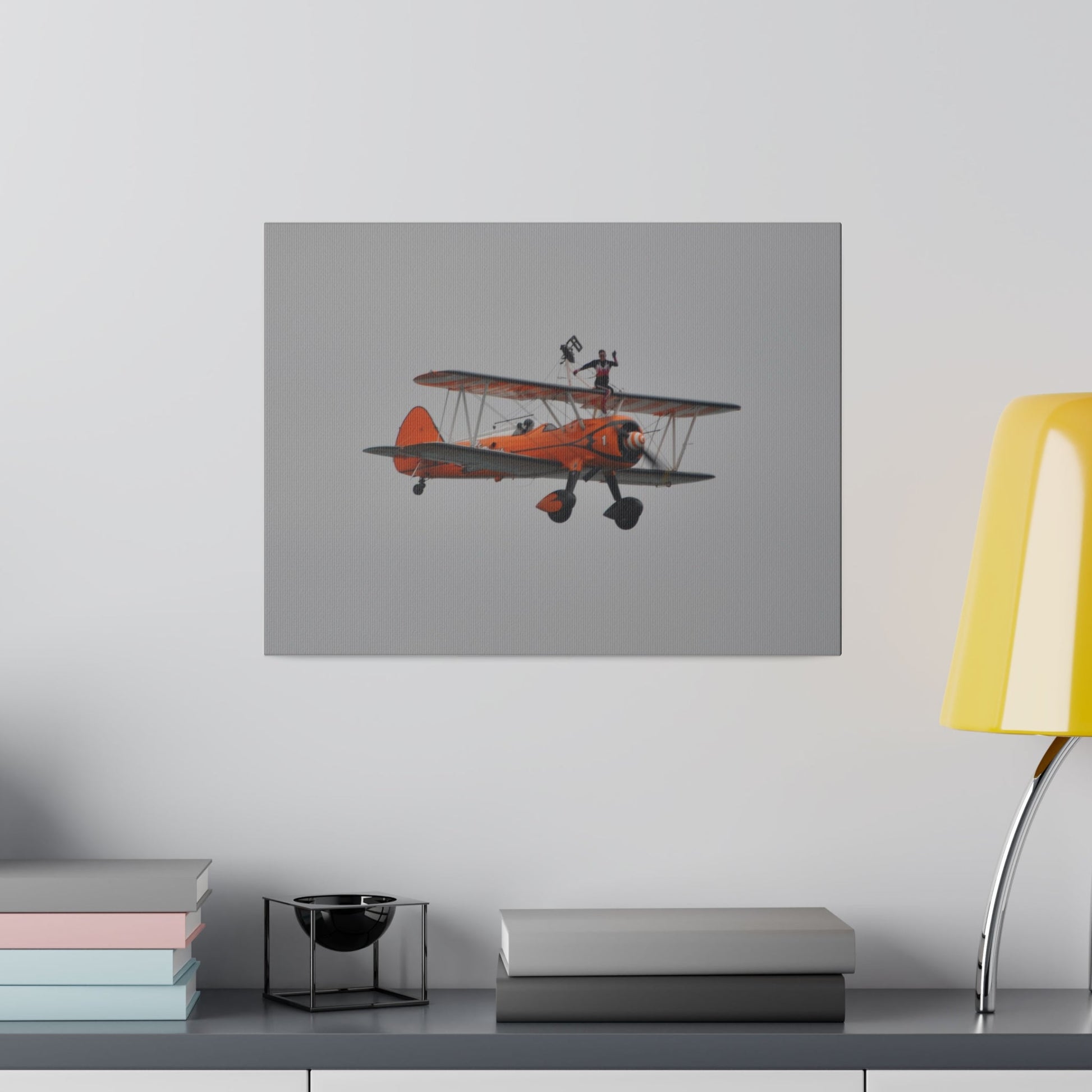 Single Wing Walker Flying From The Left, Front View Much Closer, Person Sitting On The Wing Without The Harness Looking Towards Us, Matte Canvas, Stretched, 0.75" - The Trio Synergize Group