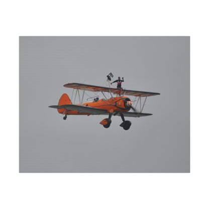 Single Wing Walker Flying From The Left, Front View Much Closer, Person Sitting On The Wing Without The Harness Looking Towards Us, Matte Canvas, Stretched, 0.75" - The Trio Synergize Group