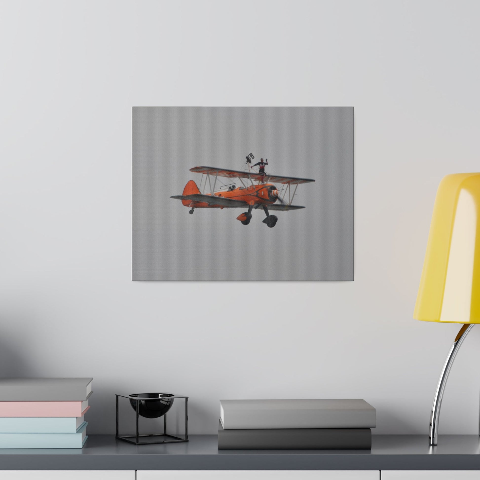 Single Wing Walker Flying From The Left, Front View Much Closer, Person Sitting On The Wing Without The Harness Looking Towards Us, Matte Canvas, Stretched, 0.75" - The Trio Synergize Group