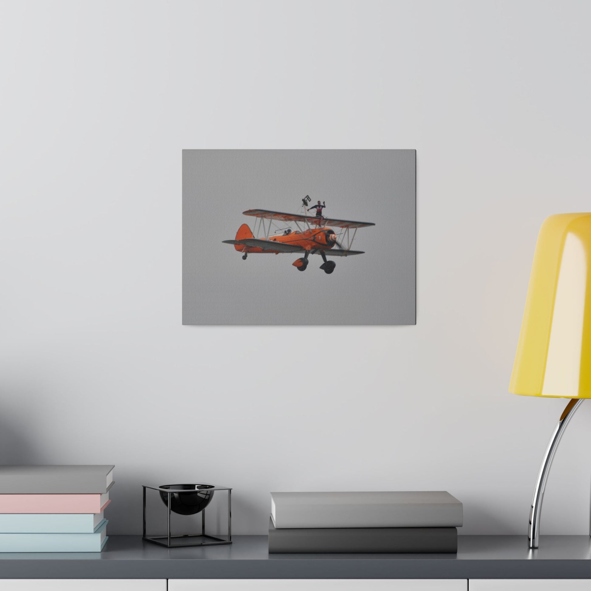Single Wing Walker Flying From The Left, Front View Much Closer, Person Sitting On The Wing Without The Harness Looking Towards Us, Matte Canvas, Stretched, 0.75" - The Trio Synergize Group