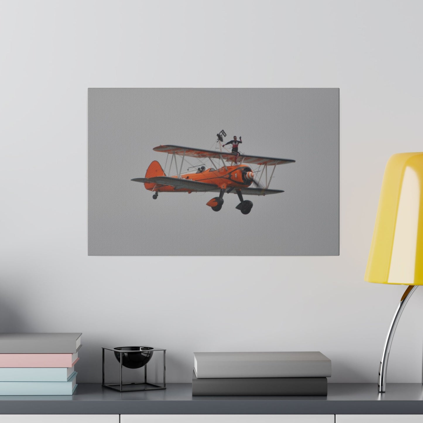 Single Wing Walker Flying From The Left, Front View Much Closer, Person Sitting On The Wing Without The Harness Looking Towards Us, Matte Canvas, Stretched, 0.75" - The Trio Synergize Group