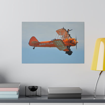 Single Wing Walker Flying From The Left Side View, With The Person Sitting On The Wing Reaching Out, Very Close Up, Matte Canvas, Stretched, 0.75" - The Trio Synergize Group