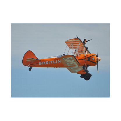 Single Wing Walker Flying From The Left Side View, With The Person Sitting On The Wing Reaching Out, Very Close Up, Matte Canvas, Stretched, 0.75" - The Trio Synergize Group