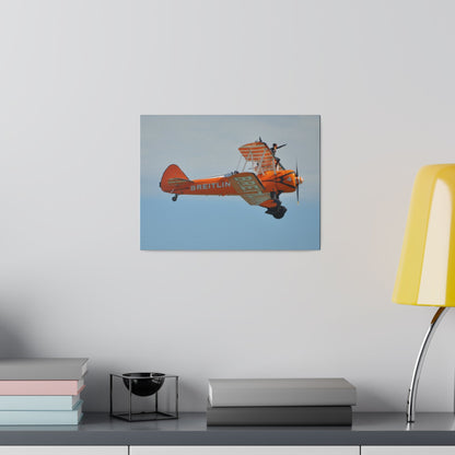 Single Wing Walker Flying From The Left Side View, With The Person Sitting On The Wing Reaching Out, Very Close Up, Matte Canvas, Stretched, 0.75" - The Trio Synergize Group