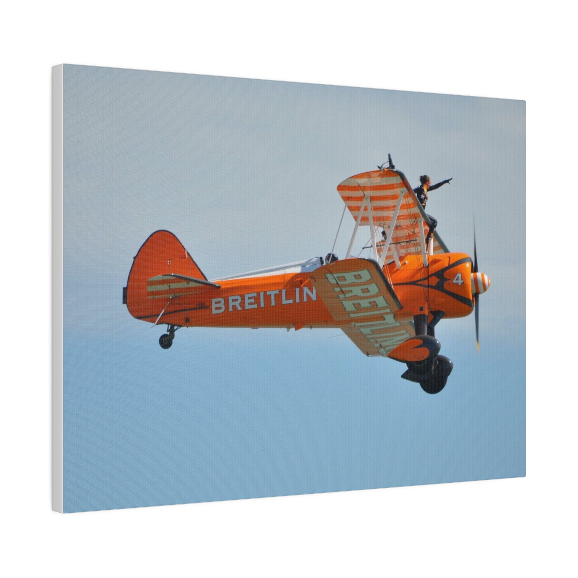 Single Wing Walker Flying From The Left Side View, With The Person Sitting On The Wing Reaching Out, Very Close Up, Matte Canvas, Stretched, 0.75" - The Trio Synergize Group