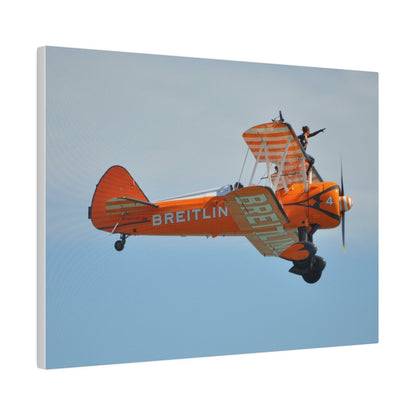 Single Wing Walker Flying From The Left Side View, With The Person Sitting On The Wing Reaching Out, Very Close Up, Matte Canvas, Stretched, 0.75" - The Trio Synergize Group