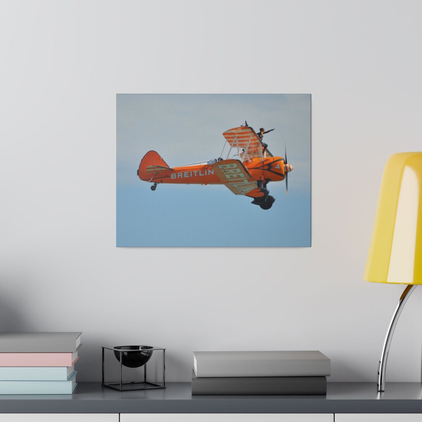 Single Wing Walker Flying From The Left Side View, With The Person Sitting On The Wing Reaching Out, Very Close Up, Matte Canvas, Stretched, 0.75" - The Trio Synergize Group
