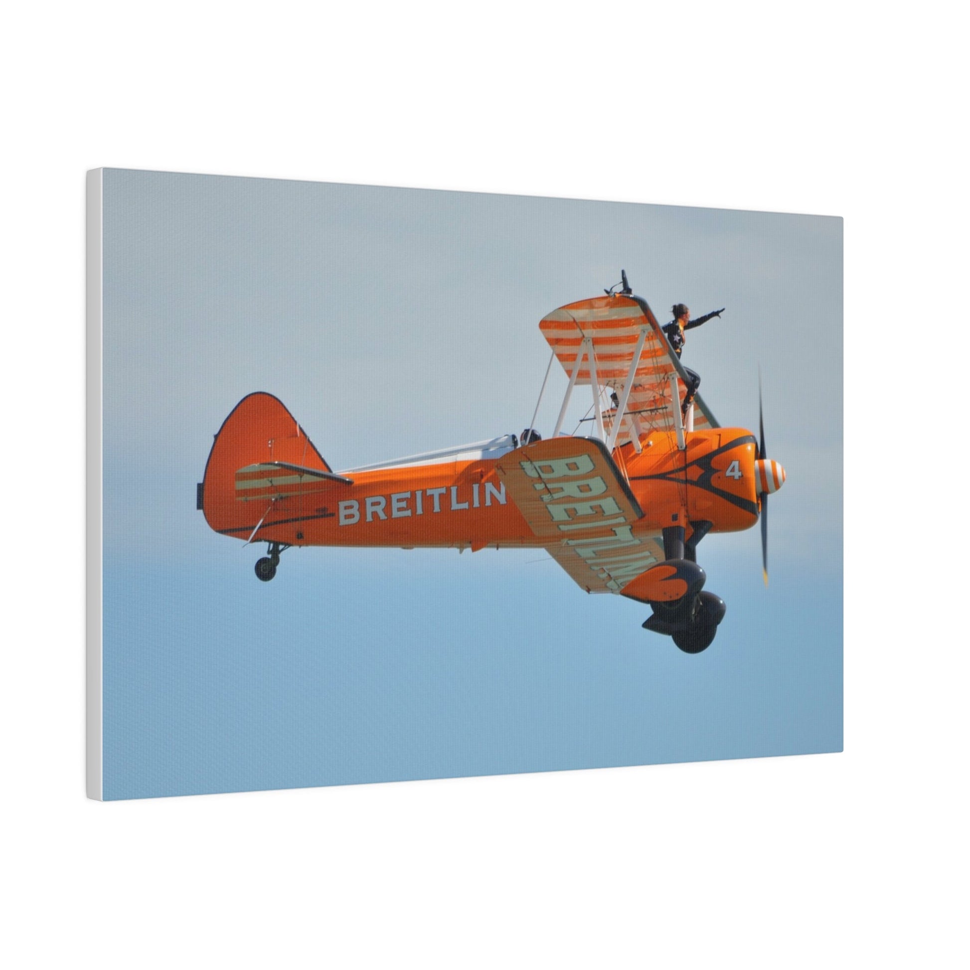 Single Wing Walker Flying From The Left Side View, With The Person Sitting On The Wing Reaching Out, Very Close Up, Matte Canvas, Stretched, 0.75" - The Trio Synergize Group