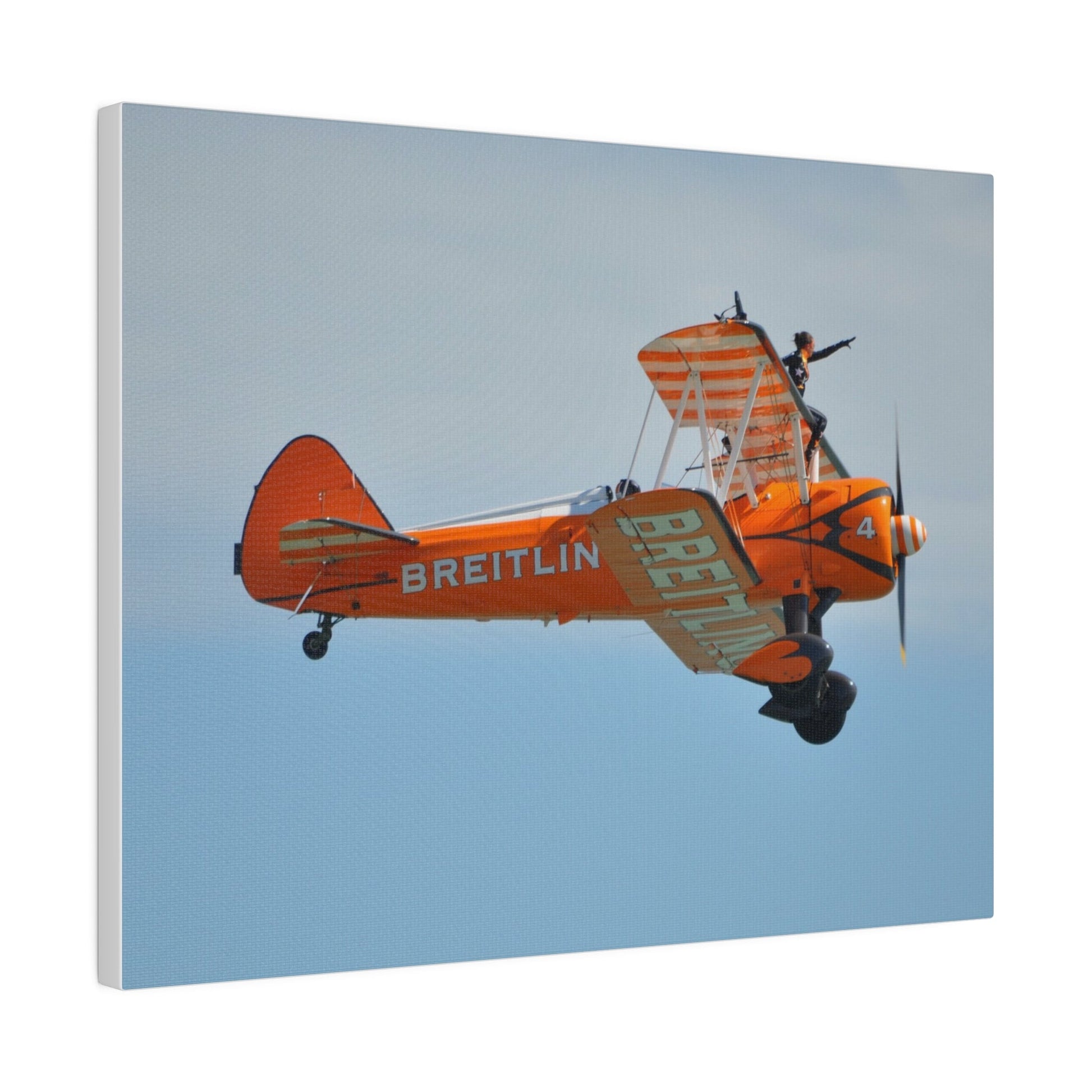 Single Wing Walker Flying From The Left Side View, With The Person Sitting On The Wing Reaching Out, Very Close Up, Matte Canvas, Stretched, 0.75" - The Trio Synergize Group