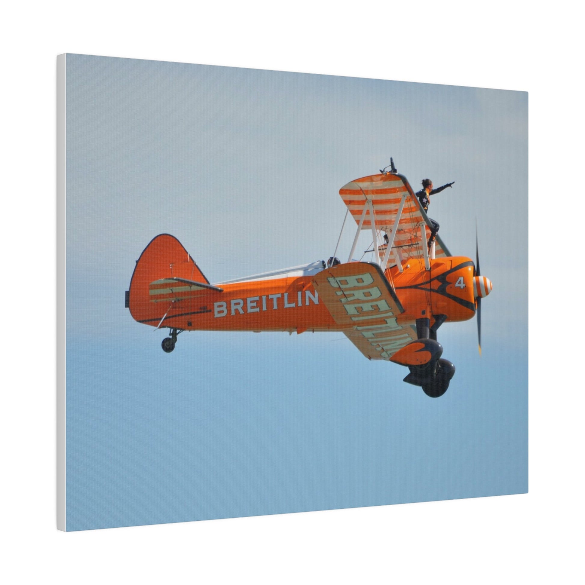 Single Wing Walker Flying From The Left Side View, With The Person Sitting On The Wing Reaching Out, Very Close Up, Matte Canvas, Stretched, 0.75" - The Trio Synergize Group