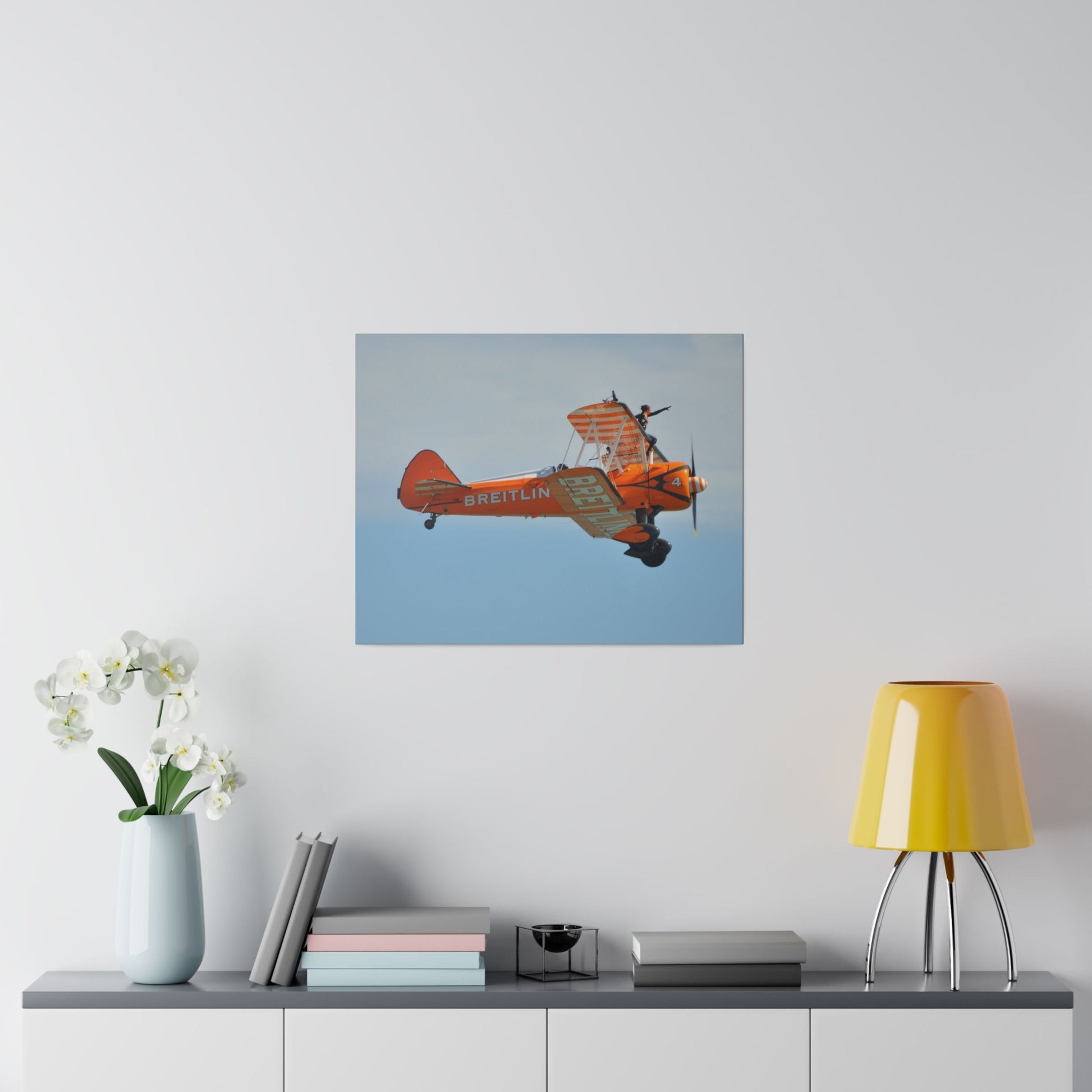 Single Wing Walker Flying From The Left Side View, With The Person Sitting On The Wing Reaching Out, Very Close Up, Matte Canvas, Stretched, 0.75" - The Trio Synergize Group