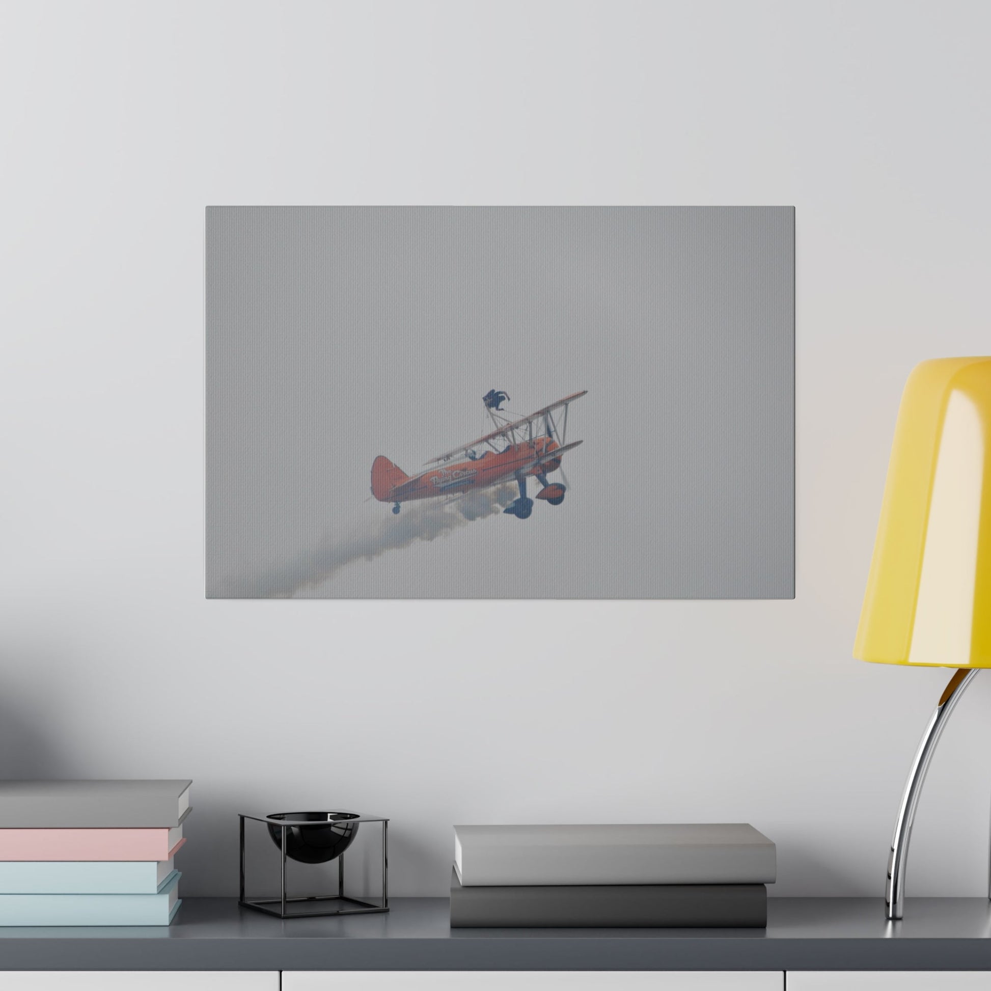 Single Wing Walker Flying From The Left With Side View Ascending, With Smoke And Person Laying Sideways Close Up, Matte Canvas, Stretched, 0.75" - The Trio Synergize Group
