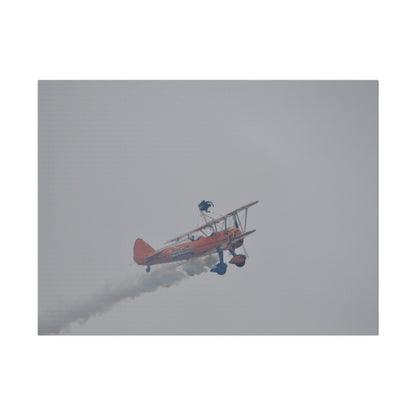 Single Wing Walker Flying From The Left With Side View Ascending, With Smoke And Person Laying Sideways Close Up, Matte Canvas, Stretched, 0.75" - The Trio Synergize Group