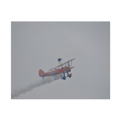Single Wing Walker Flying From The Left With Side View Ascending, With Smoke And Person Laying Sideways Close Up, Matte Canvas, Stretched, 0.75" - The Trio Synergize Group
