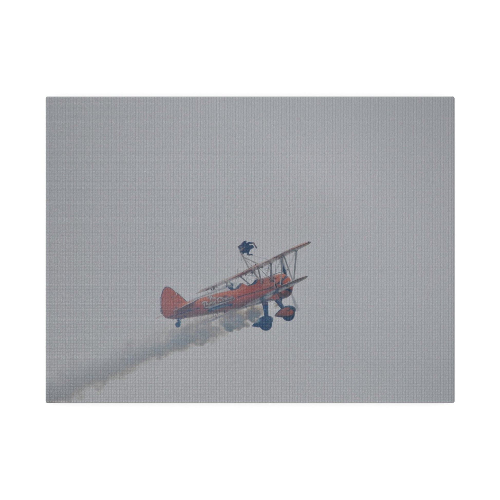 Single Wing Walker Flying From The Left With Side View Ascending, With Smoke And Person Laying Sideways Close Up, Matte Canvas, Stretched, 0.75" - The Trio Synergize Group
