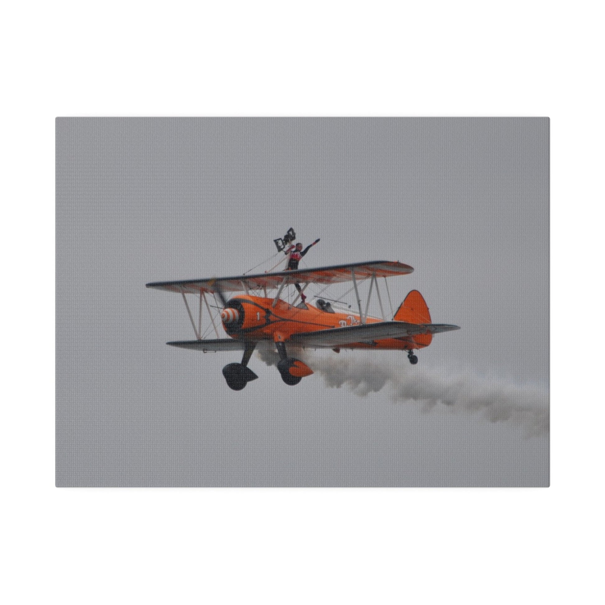 Single Wing Walker Flying From The Right, Front Side View Much Closer Up, Person Standing Without The Harness With Left Arm Out, With Smoke, Matte Canvas, Stretched, 0.75" - The Trio Synergize Group