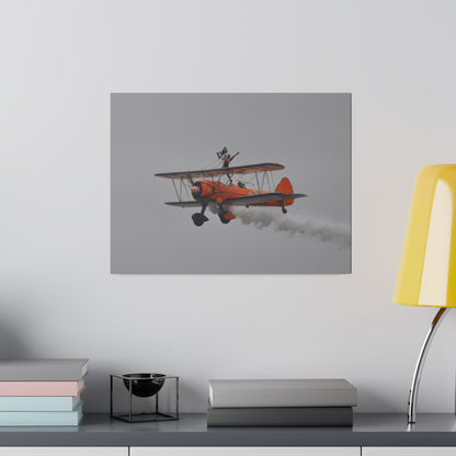 Single Wing Walker Flying From The Right, Front Side View Much Closer Up, Person Standing Without The Harness With Left Arm Out, With Smoke, Matte Canvas, Stretched, 0.75" - The Trio Synergize Group