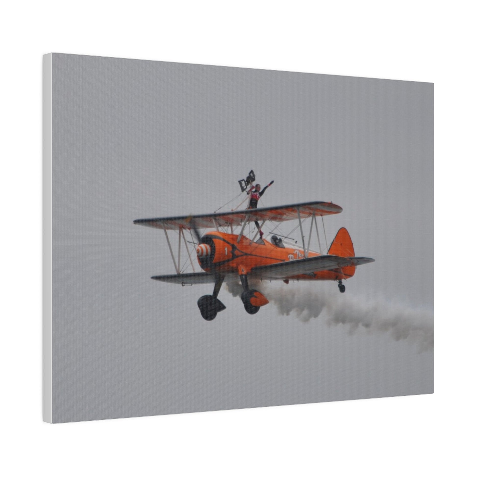 Single Wing Walker Flying From The Right, Front Side View Much Closer Up, Person Standing Without The Harness With Left Arm Out, With Smoke, Matte Canvas, Stretched, 0.75" - The Trio Synergize Group