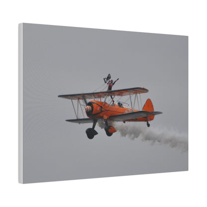 Single Wing Walker Flying From The Right, Front Side View Much Closer Up, Person Standing Without The Harness With Left Arm Out, With Smoke, Matte Canvas, Stretched, 0.75" - The Trio Synergize Group