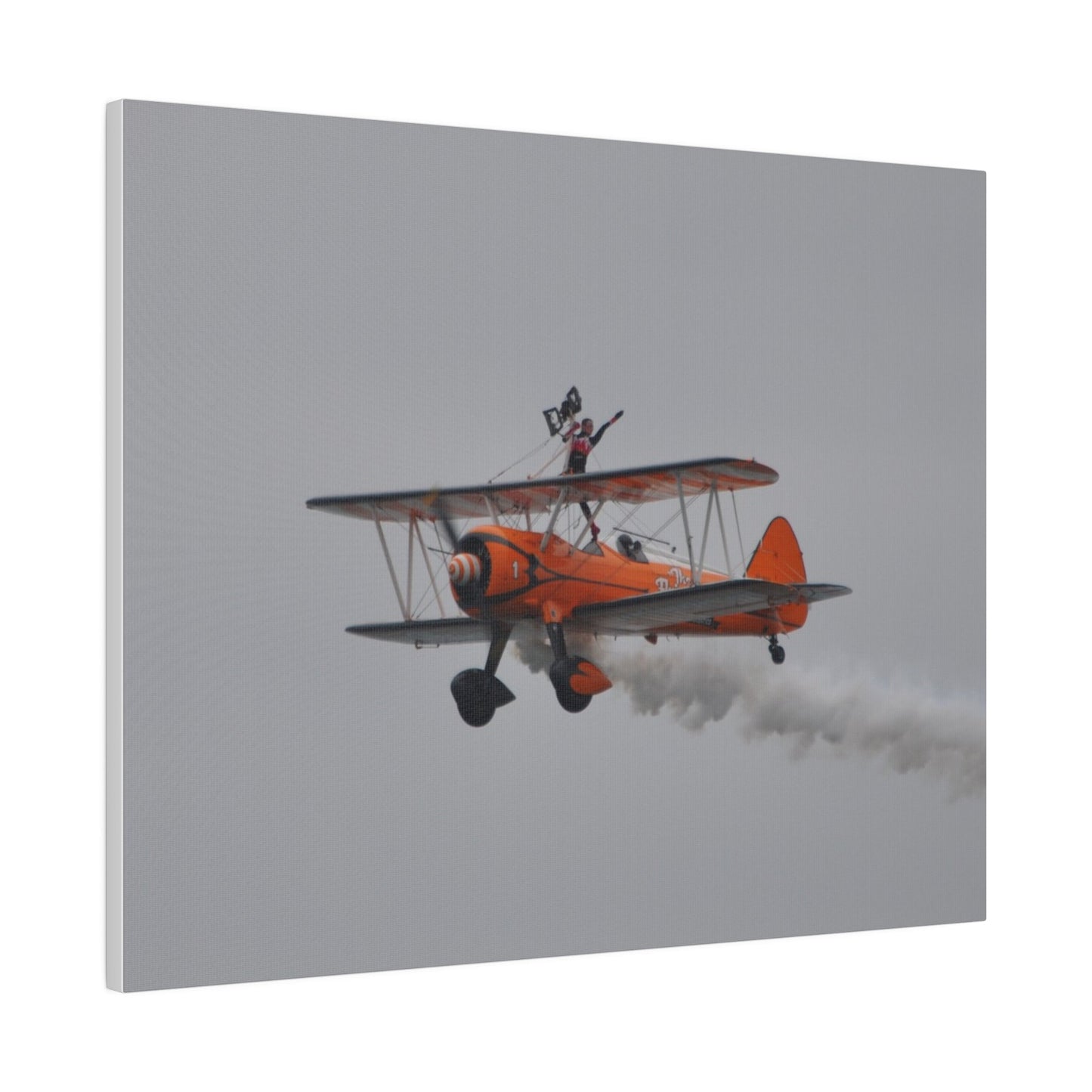 Single Wing Walker Flying From The Right, Front Side View Much Closer Up, Person Standing Without The Harness With Left Arm Out, With Smoke, Matte Canvas, Stretched, 0.75" - The Trio Synergize Group