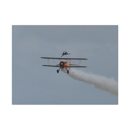 Single Wing Walker Flying Straight Forward With Smoke, With The Person Laying Sideways, Matte Canvas, Stretched, 0.75" - The Trio Synergize Group