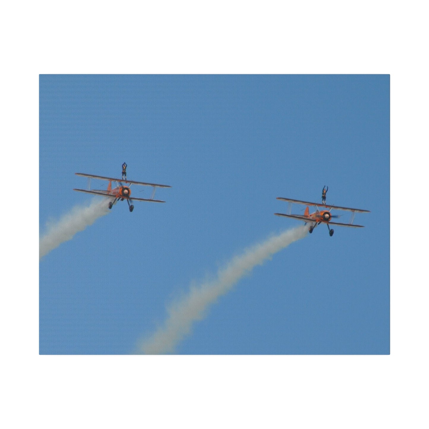 The Wing Walkers Flying From The Left, With Smoke And People With Their Arms Above Their Heads, Matte Canvas, Stretched, 0.75" - The Trio Synergize Group