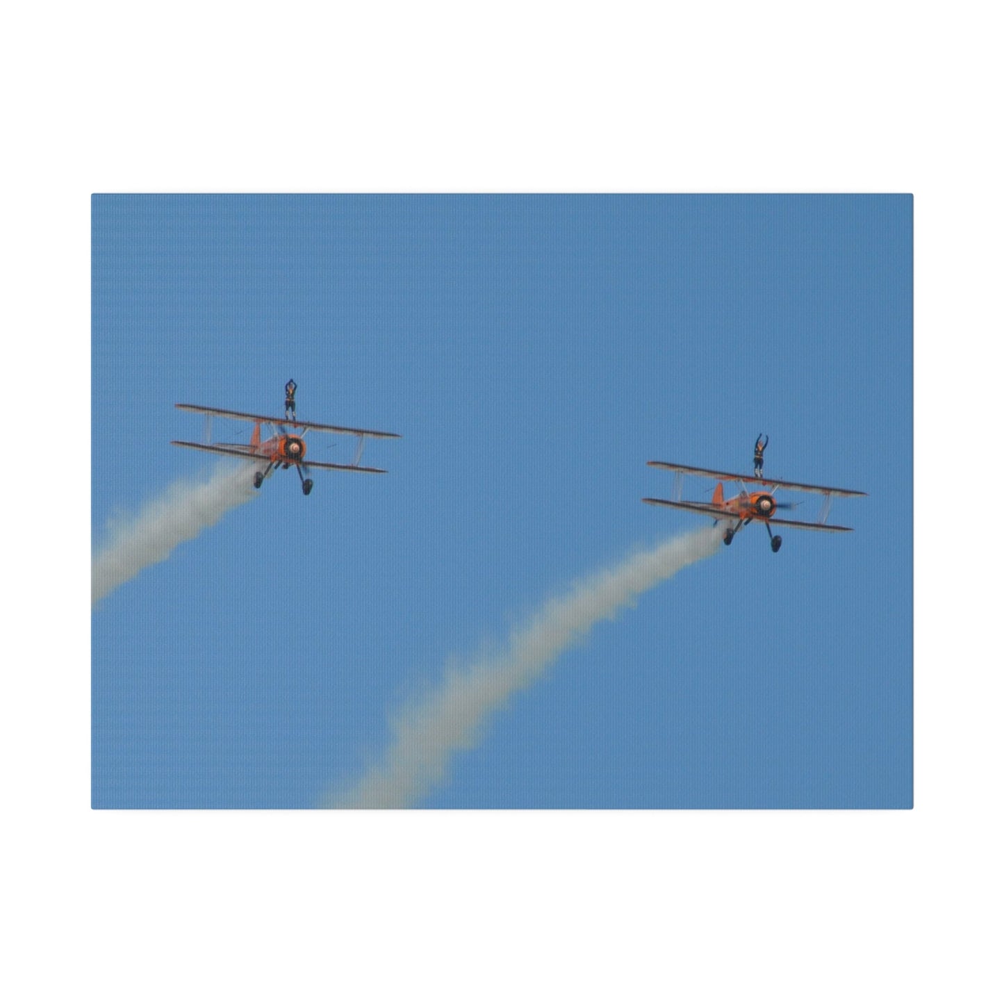 The Wing Walkers Flying From The Left, With Smoke And People With Their Arms Above Their Heads, Matte Canvas, Stretched, 0.75" - The Trio Synergize Group