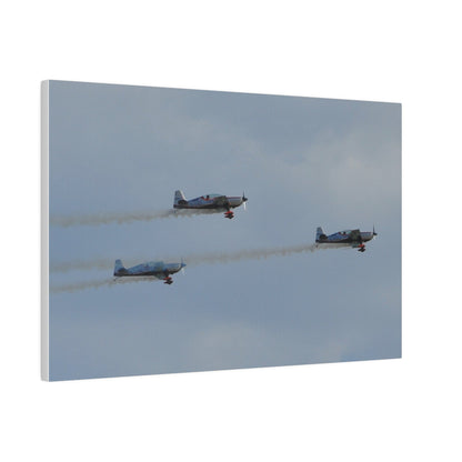 Three Blades Flying From The Left With Smoke Side View, Matte Canvas, Stretched, 0.75" - The Trio Synergize Group